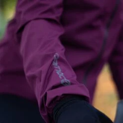 Carnac Women's Burgundy Waterproof Cycling Rain Jacket -GearNest Sale Store Close up sleeve